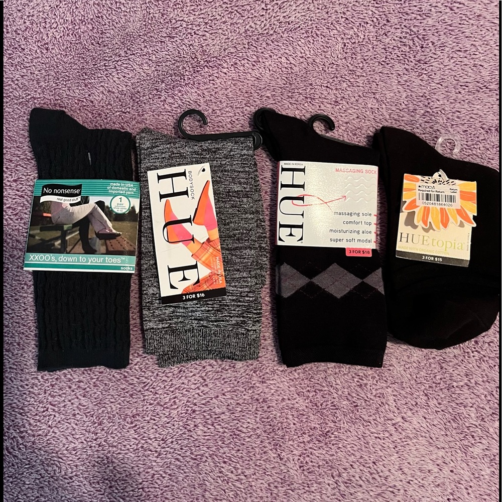 Four pairs women’s socks - three hue one no nonsense. One size.